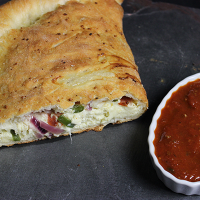 How to Make an Amazing Homemade Calzone--click for recipe from Spiced!