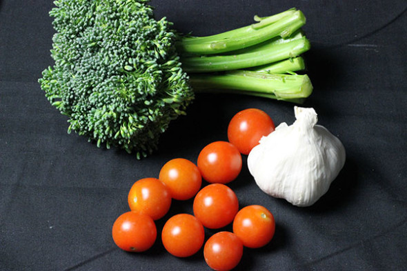 Easy + Delicious Recipe for Broccolini Tart with Cherry Tomatoes, Feta, and Fried Garlic
