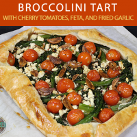 Easy + Delicious Recipe for Broccolini Tart with Cherry Tomatoes, Feta, and Fried Garlic