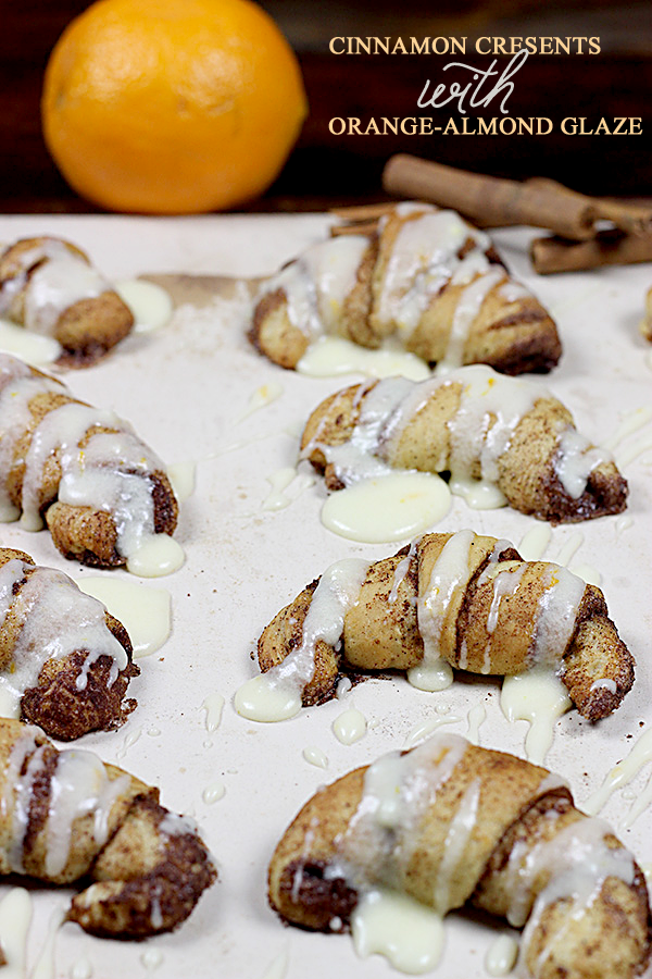 Cinnamon Crescent Rolls with Orange-Almond Glaze from spicedblog.com #cinnamonroll #cinnamonbun