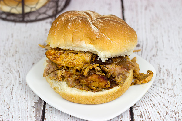 Pulled Pork Sandwich: This is one of my top 3 favorite summer recipes of all time! The pork shoulder is slow-cooked in a smoker all day, and it's absolutely delicious!