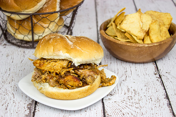 Pulled Pork Sandwich: This is one of my top 3 favorite summer recipes of all time! The pork shoulder is slow-cooked in a smoker all day, and it's absolutely delicious!