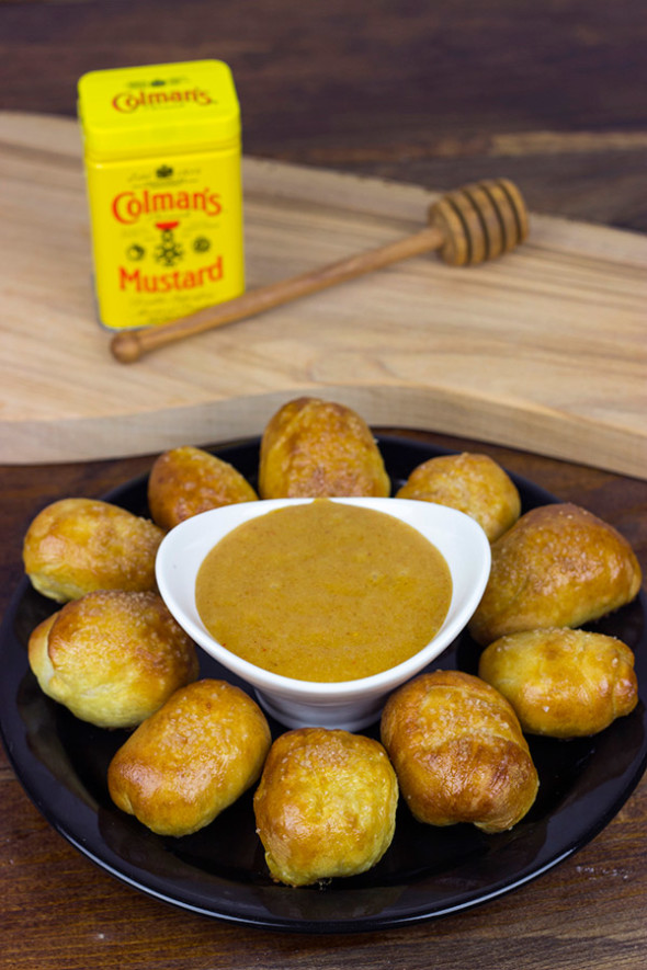 THESE ARE AMAZING! Perfect for gameday appetizers! Stuffed Pretzel Bites with Homemade Honey Mustard Dipping Sauce