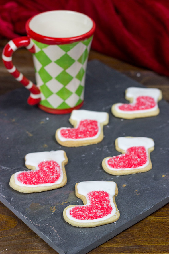Classic Christmas Cookies: Thin butter cookie topped with icing and festive decorations