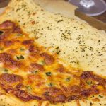 Napoleon Hat Pizza: It's half pizza-half calzone and 100% awesome!!