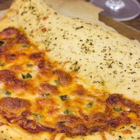 Napoleon Hat Pizza: It's half pizza-half calzone and 100% awesome!!