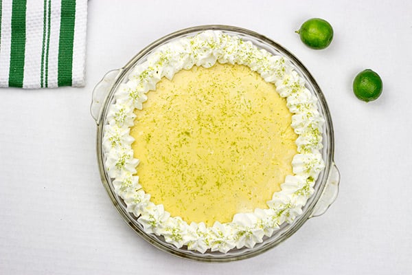 Classic Key Lime Pie: a tart key lime filling inside of a sweet graham cracker crust!