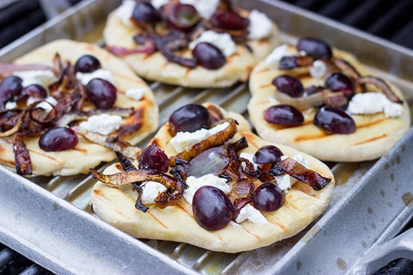 Grilled Goat Cheese Flatbread with Caramelized Onions + Roasted Red Grapes