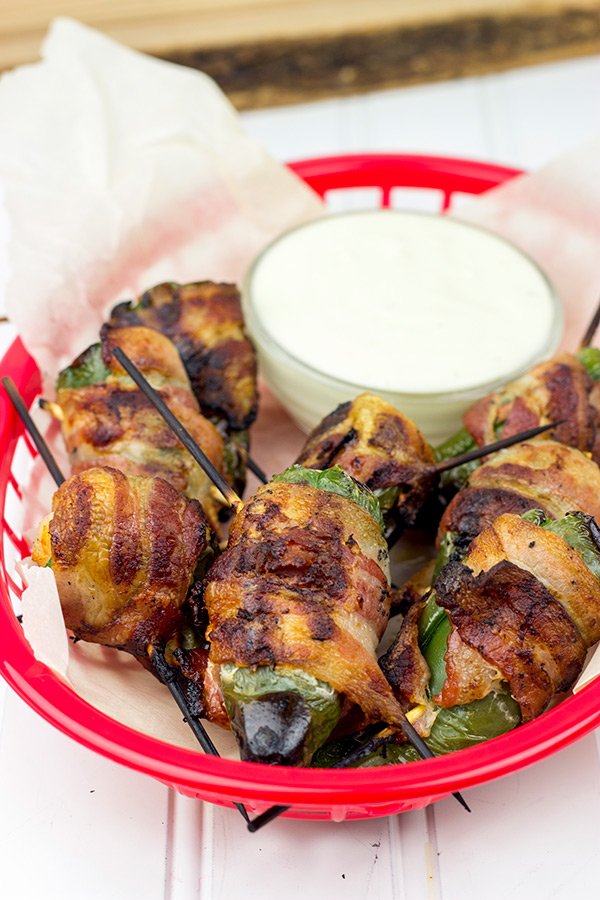 Grilled Jalapeno Poppers: These jalapenos are stuffed with shrimp and wrapped with bacon to create the PERFECT summer grilled appetizer!