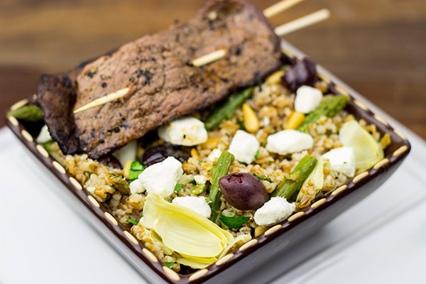 Mediterrean Bulgur Wheat Salad: This healthy salad is topped with grilled flank steak for a delicious summer meal!