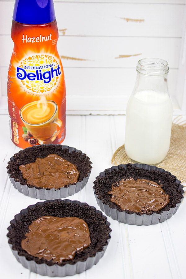 These Mini Chocolate Hazelnut Mousse Pies are creamy, chocolatey and chilled...they're perfect for a summer picnic or BBQ!