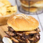 This Smoked Brisket Sandwich is absolutely delicious! Making a homemade smoked brisket is the perfect recipe for a warm summer day!