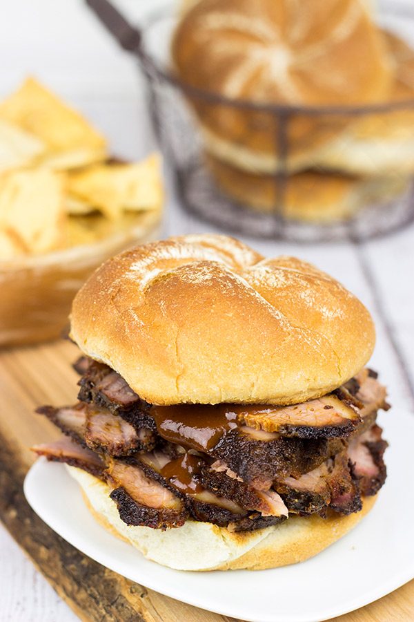 This Smoked Brisket Sandwich is absolutely delicious! Making a homemade smoked brisket is the perfect recipe for a warm summer day!