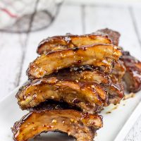 Nothing says summer like grilling ribs in your backyard. These Sweet Chili Glazed Baby Back Ribs offer a fun twist on an American classic!