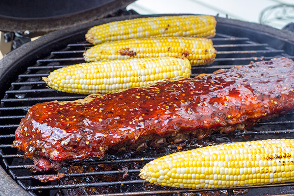 Nothing says summer like grilling ribs in your backyard. These Sweet Chili Glazed Baby Back Ribs offer a fun twist on an American classic!
