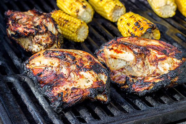 These BBQ Split Chicken Breasts are marinated overnight and then brushed with a barbecue basting sauce for ultimate levels of summer flavor!