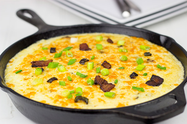 These aren't your momma's grits! These Jalapeno Cheddar Grits are easy to make and loaded with flavor! They're the perfect addition to any meal!