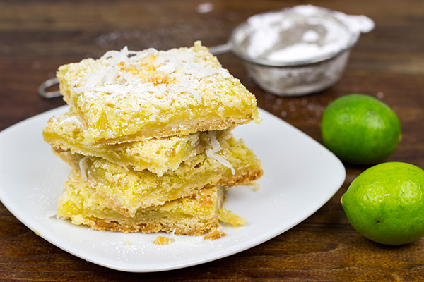 These Key Lime Coconut Bars are loaded with bright, tropical flavors...and they make for one heck of a delicious summer dessert!