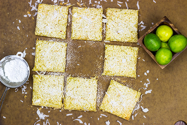 These Key Lime Coconut Bars are loaded with bright, tropical flavors...and they make for one heck of a delicious summer dessert!