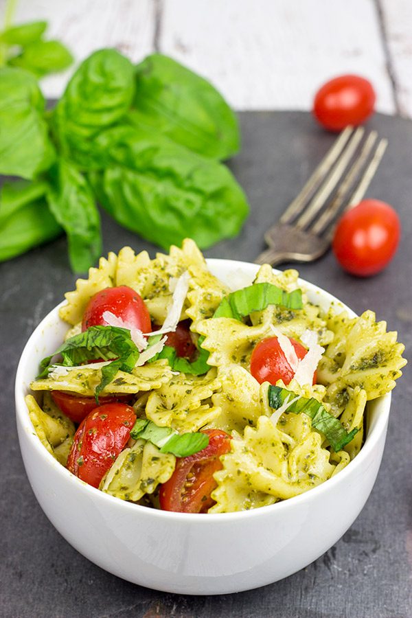 This Pesto Pasta Salad with Grilled Chicken is an easy and delicious weeknight meal. Serve it cold as a summer pasta salad or hot as a delicious winter entree!