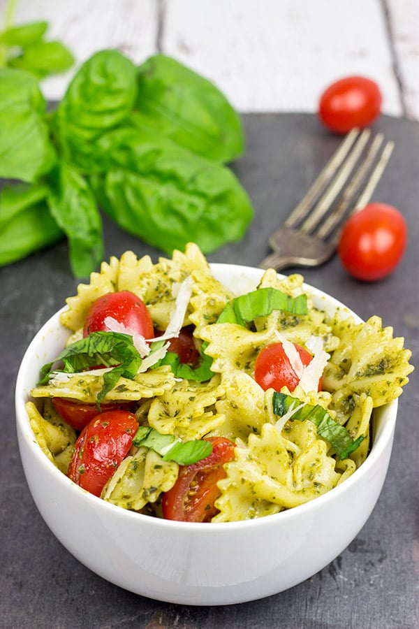 This Pesto Pasta Salad with Grilled Chicken is an easy and delicious weeknight meal. Serve it cold as a summer pasta salad or hot as a delicious winter entree!
