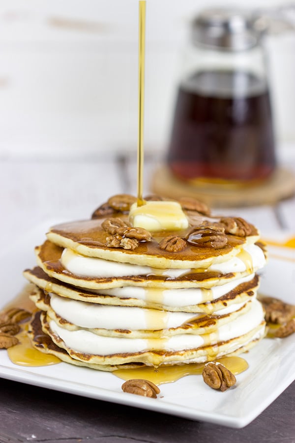Featuring alternating layers of deliciousness, these Buttermilk Pancakes with Butter Pecan Cream are one awesome breakfast treat!