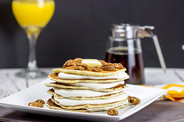 Featuring alternating layers of deliciousness, these Buttermilk Pancakes with Butter Pecan Cream are one awesome breakfast treat!