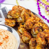 Get tailgating season started off right with this tasty Cajun Grilled Shrimp with Spicy Dipping Sauce!