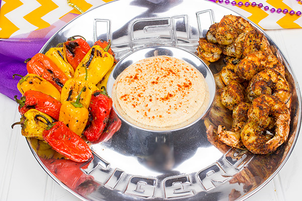 Get tailgating season started off right with this tasty Cajun Grilled Shrimp with Spicy Dipping Sauce!
