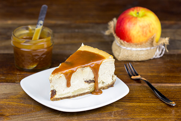 This Caramel Apple Cheesecake is loaded with apple flavor, and it's baked in a gingersnap crust. It's everything you love about the Fall...just in cheesecake form!