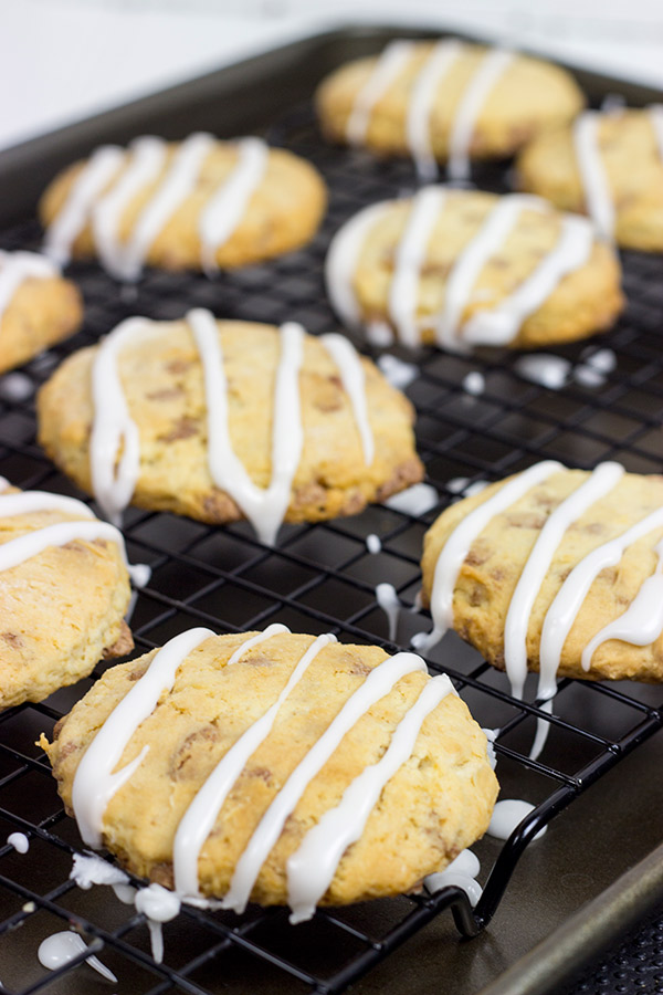 Crispy, crumbly and drizzled with a cinnamon glaze, these Cinnamon Roll Tea Cookies are a delicious partner to your morning coffee or afternoon tea!