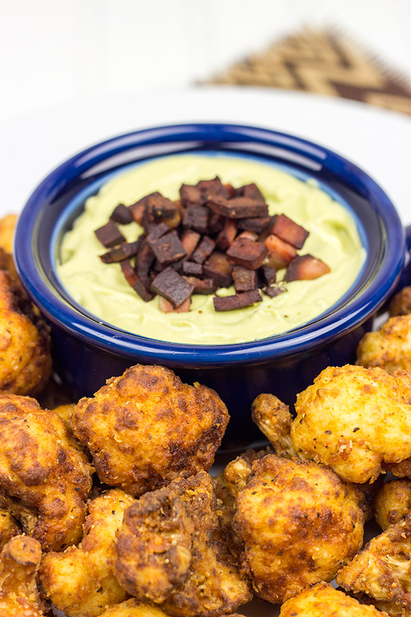 This Fried Cauliflower is paired with a Spicy Avocado Cream to create one delicious appetizer!