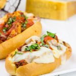 This Grilled Chicken Parm Sandwich is covered with pasta sauce and melted cheese to create a lighter version of a classic sandwich!