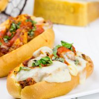 This Grilled Chicken Parm Sandwich is covered with pasta sauce and melted cheese to create a lighter version of a classic sandwich!