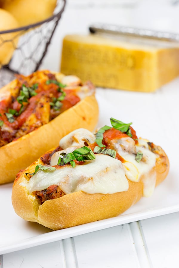 This Grilled Chicken Parm Sandwich is covered with pasta sauce and melted cheese to create a lighter version of a classic sandwich!