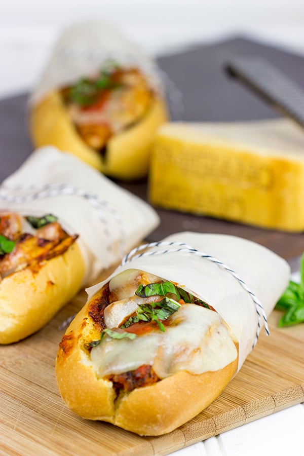 This Grilled Chicken Parm Sandwich is covered with pasta sauce and melted cheese to create a lighter version of a classic sandwich! #shop
