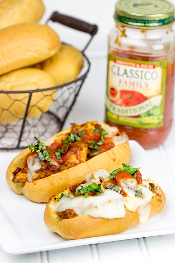 This Grilled Chicken Parm Sandwich is covered with pasta sauce and melted cheese to create a lighter version of a classic sandwich! #shop