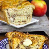 This Apple Pie Bread is complete with a cinnamon apple filling. Toast up a slice of this bread for a tasty treat on a cool Fall morning!