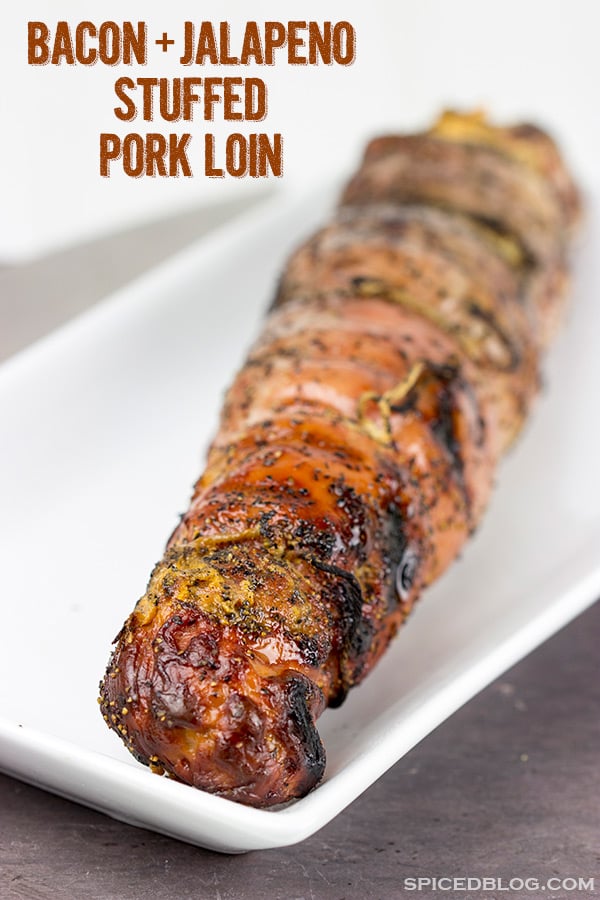 Stuffed with crispy bacon, diced jalapenos and cream cheese, these Bacon & Jalapeno Stuffed Grilled Pork Tenderloins are a delicious grilled game day treat!