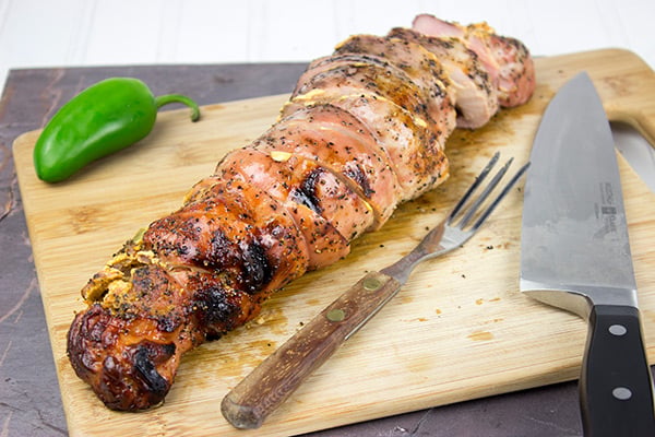 Stuffed with crispy bacon, diced jalapenos and cream cheese, these Bacon & Jalapeno Stuffed Grilled Pork Tenderloins are a delicious grilled game day treat!