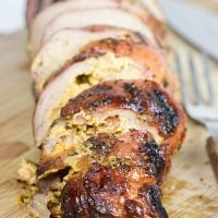 Stuffed with crispy bacon, diced jalapenos and cream cheese, these Bacon & Jalapeno Stuffed Grilled Pork Tenderloins are a delicious grilled game day treat!