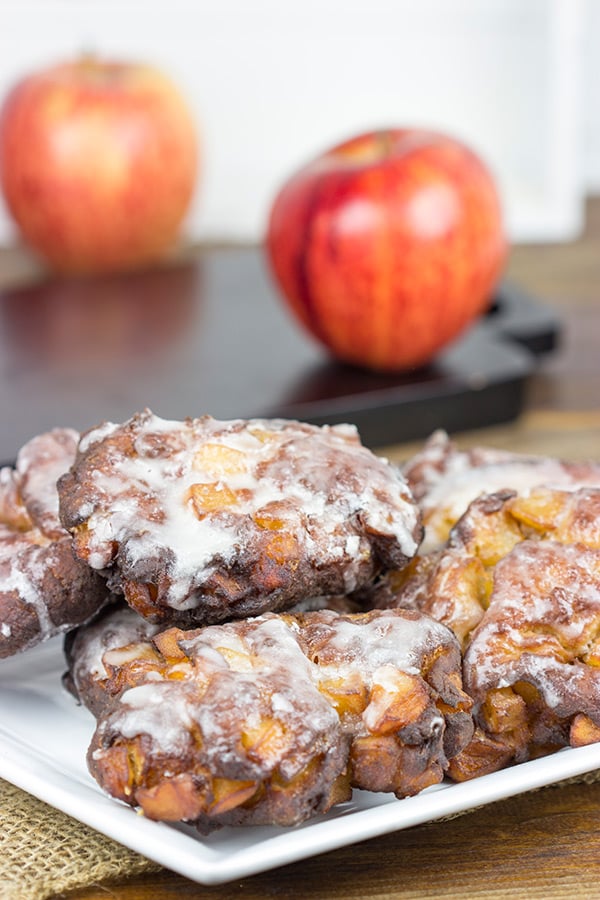 Loaded with fresh apples, these Glazed Apple Fritters are the perfect treat for a cool Fall morning!