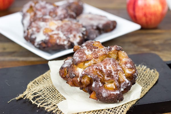 Loaded with fresh apples, these Glazed Apple Fritters are the perfect treat for a cool Fall morning!