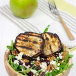 This Grilled Pear, Gorgonzola and Pecan Arugula Salad is surprisingly easy to make. Top it with a tasty, homemade Honey Balsamic Dressing for an extra boost of flavor!