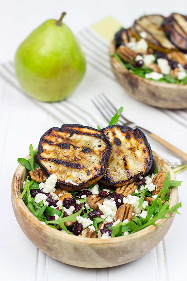 This Grilled Pear, Gorgonzola and Pecan Arugula Salad is surprisingly easy to make. Top it with a tasty, homemade Honey Balsamic Dressing for an extra boost of flavor!