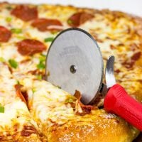 Is it a pretzel or a pizza? It's both! This Pretzel Crust Pizza is the perfect weekend meal for watching the big game!