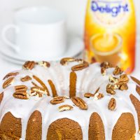 Topped with a toasted pecans and a delicious glaze, this Butter Pecan Pound Cake is the perfect sweet treat for a cool Autumn evening! #IDelight