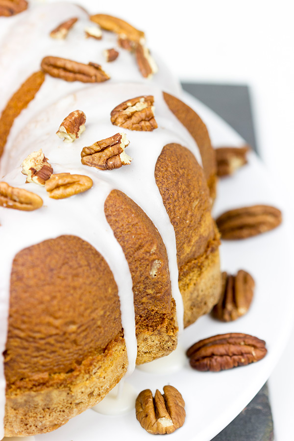 Topped with a toasted pecans and a delicious glaze, this Butter Pecan Pound Cake is the perfect sweet treat for a cool Autumn evening! #IDelight