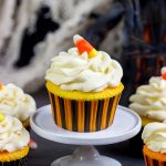 A bit of yellow and orange food coloring turns these classic vanilla cupcakes into Candy Corn Cupcakes. They're perfect for Halloween!