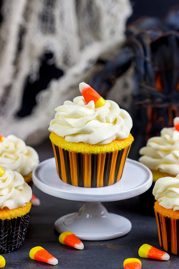 A bit of yellow and orange food coloring turns these classic vanilla cupcakes into Candy Corn Cupcakes. They're perfect for Halloween!